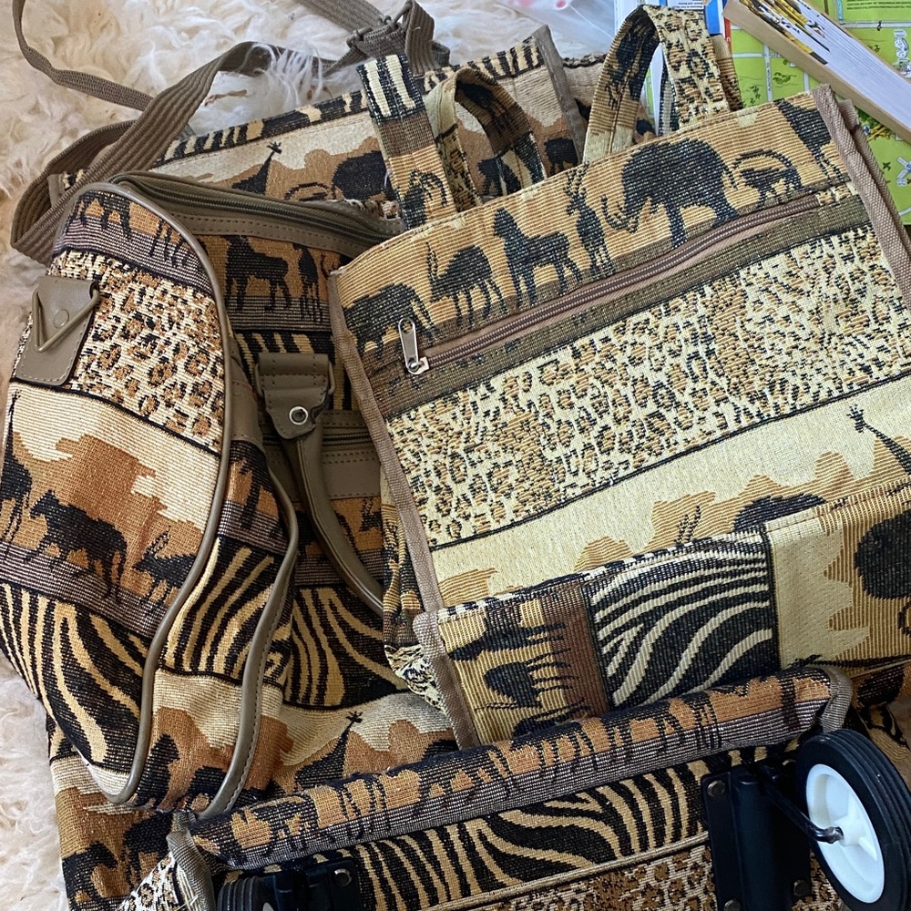 3 animal print travel bags